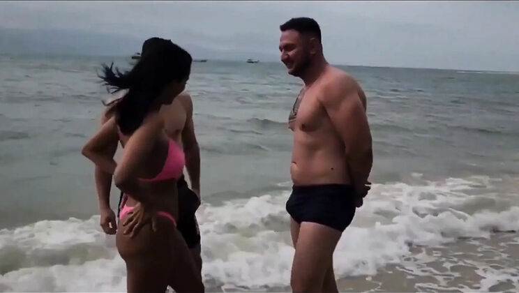 Amateur Latina MILF Makes Out With Two Guys on the Beach Before a Threesome BJ