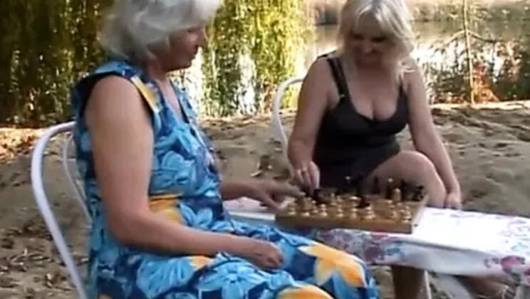 Long haired blonde slut fingers horny grandma on the bench