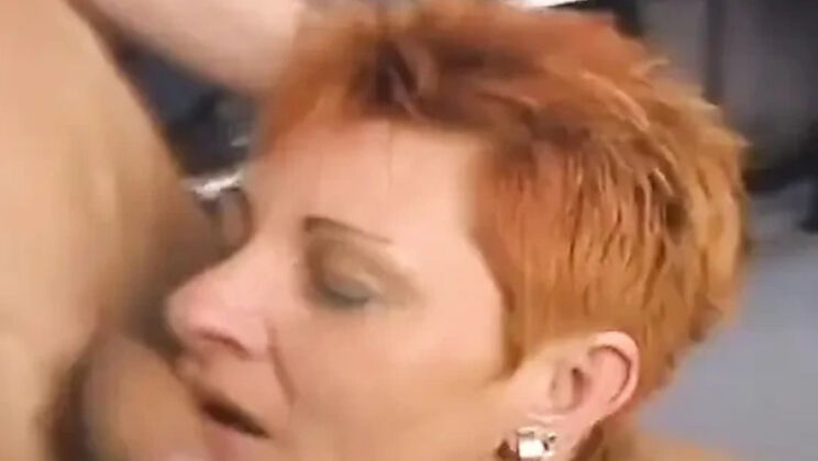 Short-Haired Cougar Sucks and Swallows Cum to Get the Job